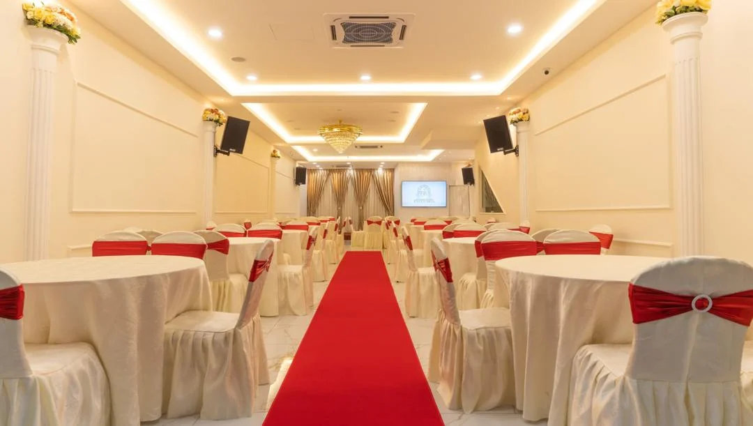 BK Event Hall with its real red-carpet aisle and dressed seating